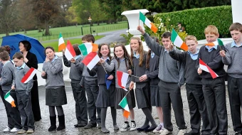 Schoolchildren attend a ceremonial welcome and tree planting at Aras an Uachtarain, the official residence of the president of Ireland, during a state visit by His Serene Highness Prince Albert II of Monaco and his fiancee, Charlene Wittstock, on April 4, 2011, in Dublin.