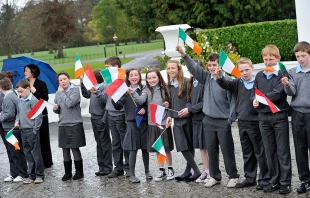 Schoolchildren attend a ceremonial welcome and tree planting at Aras an Uachtarain, the official residence of the president of Ireland, during a state visit by His Serene Highness Prince Albert II of Monaco and his fiancee, Charlene Wittstock, on April 4, 2011, in Dublin. Credit: Gareth Cattermole/Getty Images