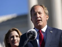 Texas Attorney General Ken Paxton on Nov. 24, 2025, sued his own state’s housing agency for rules that allegedly restrict Christian and other religious organizations from receiving public funds to serve homeless and low-income people.
