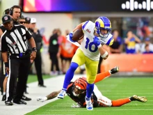 Los Angeles Rams' Cooper Kupp (L) breaks away from Cincinnati Bengals' Jessie Bates III during Super Bowl LVI between the Los Angeles Rams and the Cincinnati Bengals at SoFi Stadium in Inglewood, California, on February 13, 2022.