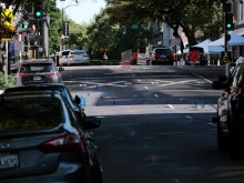 Police markers are placed in the street on the corner of 10th and L street at the scene of a shooting that occurred in the early morning hours on April 3, 2022 in Sacramento, California.