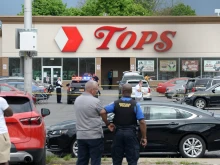olice on scene at a Tops Friendly Market on May 14, 2022 in Buffalo, New York. According to reports, at least 10 people were killed after a mass shooting at the store with the shooter in police custody.