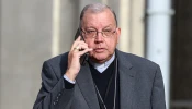 Then-Bishop of Verdun Jean-Paul Gusching speaks on the phone before the closing speech on the last day of the Conference des Eveques de France (French Bishops’ Conference), in Lourdes, southwestern France, on Nov. 8, 2022.