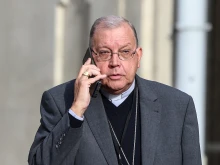 Then-Bishop of Verdun Jean-Paul Gusching speaks on the phone before the closing speech on the last day of the Conference des Eveques de France (French Bishops’ Conference), in Lourdes, southwestern France, on Nov. 8, 2022.