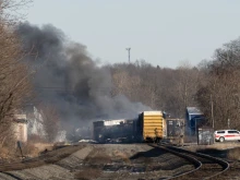 Smoke rises from a derailed cargo train in East Palestine, Ohio, on Feb. 4, 2023.