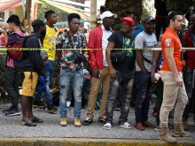 Migrants, mostly Haitians, wait in Mexico City to be sent to different migration centers in Puebla, Hidalgo, and Queretaro to obtain their humanitarian visas, which will allow them to continue their journey to the U.S. border ion March 31, 2023.