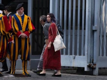 Ultima Generazione (Last Generation) climate change activists Ester Goffi (right) and Guido Viero (second right) arrive at the Vatican on May 24, 2023, to attend their second hearing for having glued themselves to the statue of "Laocoon and His Sons" at the Vatican Museums in August 2022.