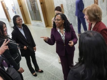U.S. Supreme Court Nominee Ketanji Brown Jackson (C) meets staff members of Sen. Tina Smith (D-MN) (R) on Capitol Hill April 04, 2022 in Washington, DC. The Senate Judiciary Committee is meeting today to hold a vote on the nomination of Jackson. If approved by the committee, the full Senate is expected to vote later this week.