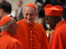 President of the Italian Bishops' Conference Cardinal Matteo Maria Zuppi (center) attends the consistory for the creation of new cardinals at St. Peter's Basilica on Aug. 27, 2022, in Vatican City.