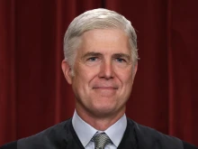 United States Supreme Court Associate Justice Neil Gorsuch poses for an official portrait at the East Conference Room of the Supreme Court building on Oct. 7, 2022, in Washington, D.C.
