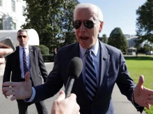 President Joe Biden speaks to members of the press prior to his Marine One departure from the White House on Oct. 20, 2022 in Washington, D.C.