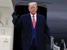 Former President Donald Trump disembarks his plane "Trump Force One" at Aberdeen Airport on May 1, 2023, in Aberdeen, Scotland.