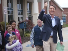 Virginia Gov. Glenn Youngkin greets voters at Haymarket Elementary School Nov. 7, 2023, in Haymarket, Virginia.