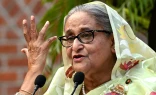 Bangladesh’s Prime Minister Sheikh Hasina gestures while speaking to the media a day after she won the 12th parliamentary elections in Dhaka on Jan. 8, 2024.