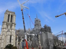 The new golden rooster is seen atop of Notre-Dame de Paris cathedral on Feb. 13, 2024, in Paris.