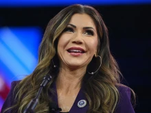 South Dakota's Governor Kristi Noem arrives to speak during the annual Conservative Political Action Conference (CPAC) meeting on Feb. 23, 2024, in National Harbor, Maryland.