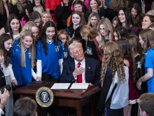 President Donald J. Trump signs an executive order banning transgender athletes from participating in women’s sports in the East Room at the White House on Feb. 5, 2025, in Washington, D.C.