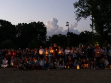 People attend a vigil following a mass shooting at Annunciation Catholic School on Aug. 27, 2025, in Minneapolis.