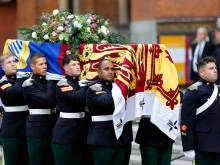 Pallbearers from The Royal Dragoon Guards carry Katharine, Duchess of Kent’s coffin, draped in the Royal Standard, into Westminster Cathedral for a Vigil for the Deceased with Rite of Reception and Vespers for the Dead ahead of her funeral on Sept. 15, 2025, in London.