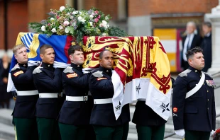 Pallbearers from The Royal Dragoon Guards carry Katharine, Duchess of Kent’s coffin, draped in the Royal Standard, into Westminster Cathedral for a Vigil for the Deceased with Rite of Reception and Vespers for the Dead ahead of her funeral on Sept. 15, 2025, in London. Credit: Max Mumby/Indigo/Getty Images