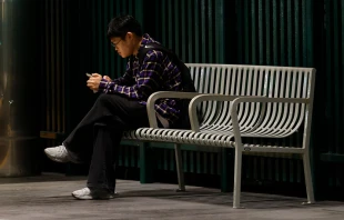 A commuter waits at the Westchester/Veterans Metro K Line station on Thursday, Oct. 2, 2025, in Los Angeles. Credit: Carlin Stiehl/Los Angeles Times via Getty Images