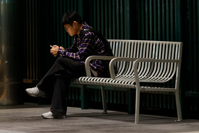 Commuter on phone in subway