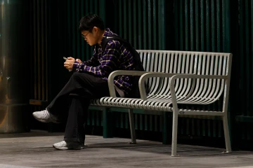 Commuter on phone in subway