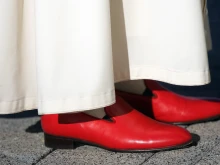 Pope Benedict XVI wearing brilliant red shoes arrives to attend an interreligious gathering at the Pope John Paul II Cultural Center on April 17, 2008, in Washington, D.C.