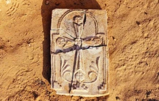 A 30-centimeter (11.8-inch) plaster cross was unearthed in an ancient monastery on Sir Bani Yas Island about 106 miles southwest Abu Dhabi, ACI MENA reported. Credit: Courtesy of Department of Culture and Tourism - Abu Dhabi