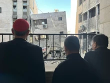 Latin Patriarch Cardinal Pierbattista Pizzaballa looks out at some of the destruction in Gaza.