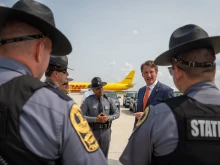 Virginia Gov. Glenn Youngkin with state police in 2023.