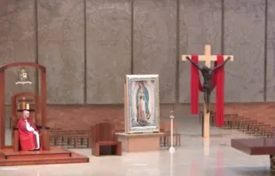 Archbishop Jose Gomez prays on Good Friday in the Los Angeles Cathedral.   Archdiocese of LA livestream