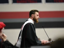 Kansas City Chiefs’ placekicker Harrison Butker speaks to college graduates in his commencement address at Benedictine College on Saturday, May 11, 2024.