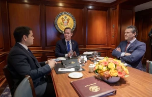 U.S. Secretary of War Pete Hegseth (at right) meets with U.S. Secretary of State Marco Rubio (at left) and then-National Security Adviser Mike Waltz (at center). Credit: The White House, Public domain, via Wikimedia Commons