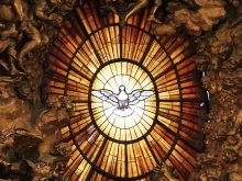 Holy Spirit stained glass in St. Peter's Basilica.