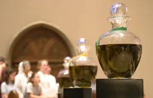 Oils on display at Chrism Mass before being blessed.   Sherry H/shutterstock