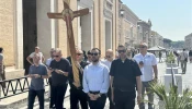 Seminarians approach the Holy Door at St. Peter’s Basilica, Tuesday, June 24, 2025