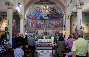Worshippers attend a Sunday morning Mass led by Cardinal Pierbattista Pizzaballa, Latin patriarch of Jerusalem, at the Roman Catholic Church of the Holy Family in Gaza City on July 20, 2025. Credit: OMAR AL-QATTAA/AFP via Getty Images