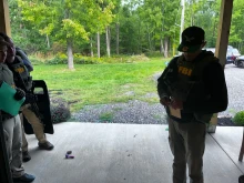 An FBI agent stands outside the Houck residence in Kintnersville, Pennsylvania, on Sept. 23, 2022. Mark Houck was arrested that day and charged with assaulting a Planned Parenthood escort outside an Philadelphia abortion clinic on Oct. 13, 2021.