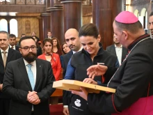 Hungarian President Katalin Novák (center) visited Iraq in early December 2022, stopping at a majority-Christian town that has been rebuilt in recent years almost entirely with Hungarian support, following years of occupation and devastation by the so-called Islamic State.