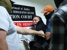 A man seeking asylum from Colombia is detained by federal agents as he attends his court hearing in immigration court at the Jacob K. Javitz Federal Building on Oct. 27, 2025, in New York City.