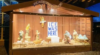 A Nativity display with anti-ICE messaging outside St. Susanna Church in Dedham, Massachusetts.