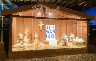 A Nativity display with anti-ICE messaging outside St. Susanna Church in Dedham, Massachusetts. Credit: Matthew McDonald