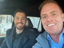 Father Michael Trummer, left, and Andrew Hansen produced a documentary, "God is Alive," using two cameras and their cell phones.