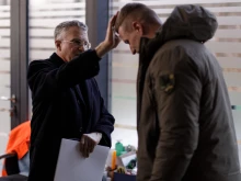 Archbishop Broglio blesses Sashko Lenevych, a lieutenant in the Armed Forces of Ukraine.