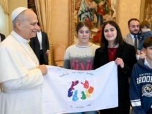 The pope with boys and girls from Italian Catholic Action on Dec. 18, 2025.