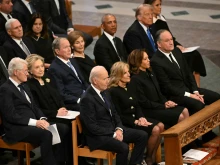 From left to right, front row: U.S. President Joe Biden, First Lady Lady Jill Biden, Vice President Kamla Harris, Second Gentleman Doug Emhoff. Second row: former President Bill Clinton, former Secretary of State Hillary Clinton, former President George W. Bush, his wife Laura Bush, former President Barack Obama, President-elect Donald Trump and his wife, Melania Trump, attend the state funeral service for former U.S. President Jimmy Carter at the Washington National Cathedral in Washington, D.C., on Jan. 9, 2025.