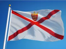 The flag of Jersey. Credit: railway fx/Shutterstock.