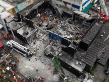 An aerial view shows rescue teams working at the Jet Set nightclub in Santo Domingo, Dominican Republic, on April 9, 2025, a day after the collapse of its roof.