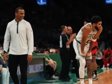 Head coach of the Boston Celtics Joe Mazzulla (left) and forward Jayson Tatum.